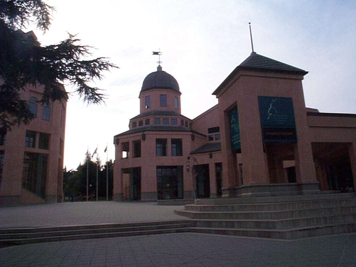 Center of the Performing Arts, and at it's left the City Hall.