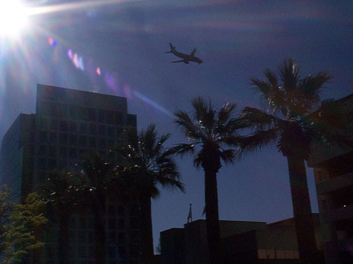 Another airplane approaching San Jose airport.